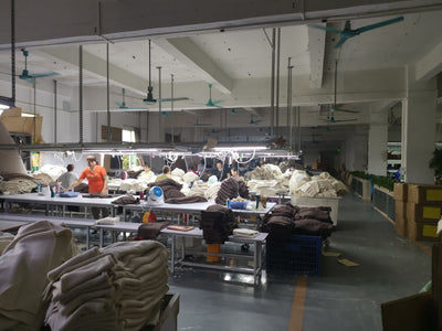 a second view in the workshop of hersweater factory, knitwear manufacturers