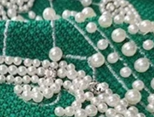 hersweaters can manufacture beaded sweaters for small batch order